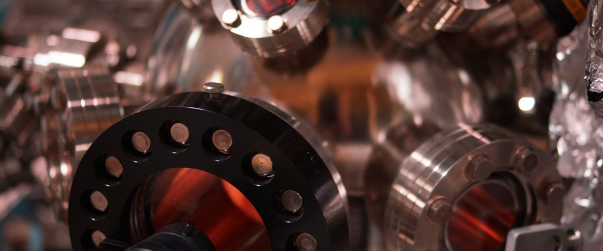 Barium ion control using Koheras ADJUSTIK HP T20 fiber laser for precise qubit manipulation
