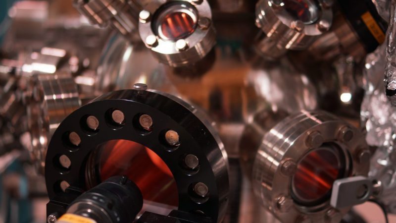 Barium ion control using Koheras ADJUSTIK HP T20 fiber laser for precise qubit manipulation