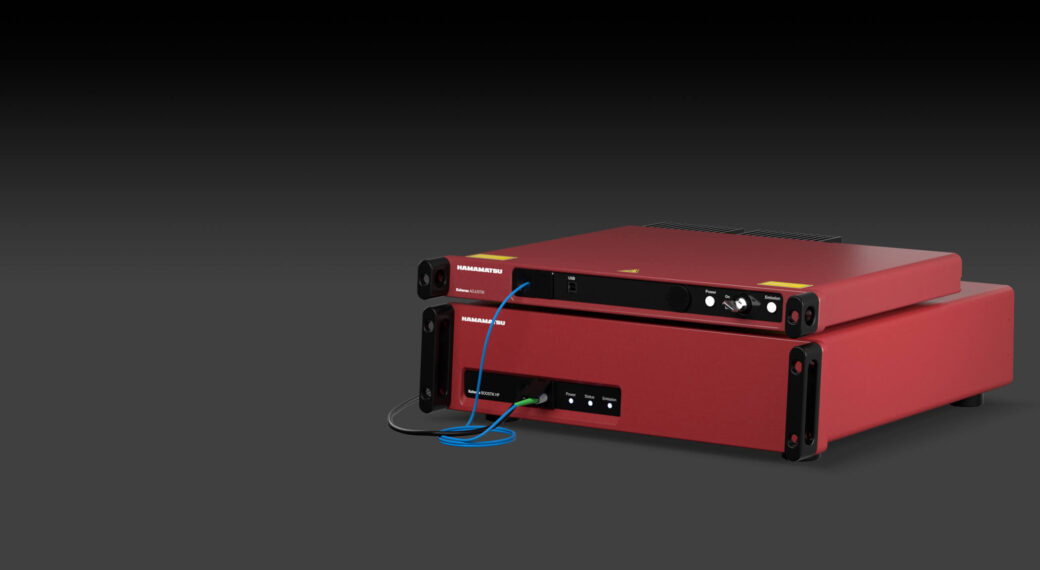 Koheras Boostik HP high power single frequency fiber laser system on dark background