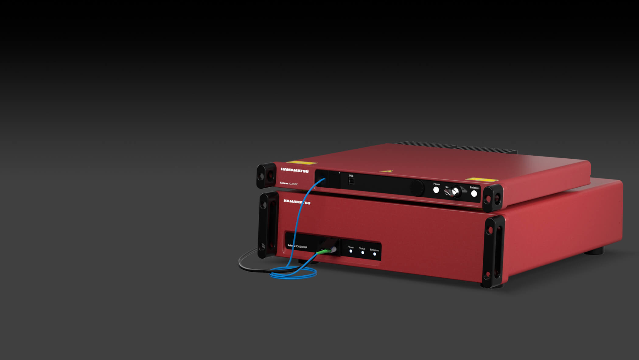 Koheras Boostik HP high power single frequency fiber laser system on dark background
