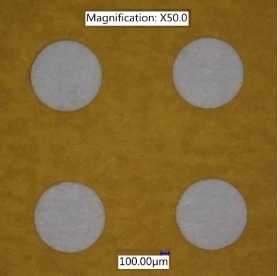 polyimide component processed with ORIGAMI XPS femtosecond laser for high‑precision, non‑thermal micromachining in medical and electronics manufacturing.